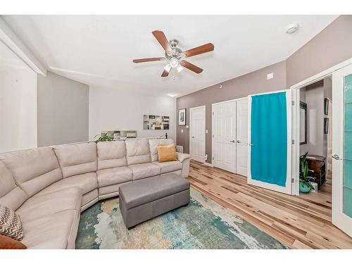 107-6650 Old Banff Coach Road Sw, Calgary, AB - Indoor Photo Showing Living Room