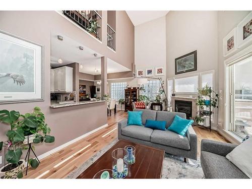 107-6650 Old Banff Coach Road Sw, Calgary, AB - Indoor Photo Showing Living Room With Fireplace