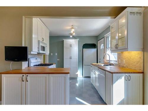 2518 20 Street Sw, Calgary, AB - Indoor Photo Showing Kitchen With Double Sink