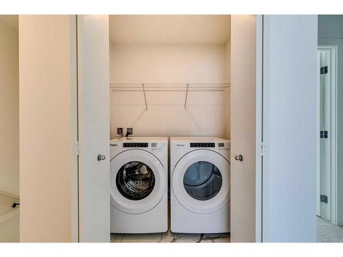 902-280 Chelsea Road, Chestermere, AB - Indoor Photo Showing Laundry Room