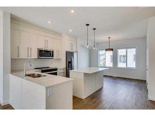 902-280 Chelsea Road, Chestermere, AB - Indoor Photo Showing Kitchen With Double Sink With Upgraded Kitchen