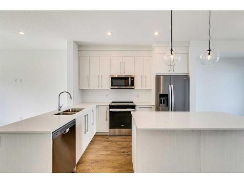 902-280 Chelsea Road, Chestermere, AB - Indoor Photo Showing Kitchen With Double Sink With Upgraded Kitchen