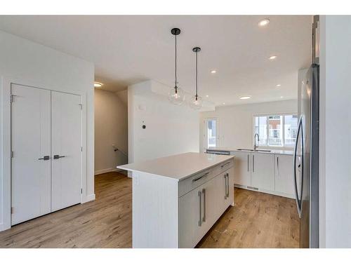 902-280 Chelsea Road, Chestermere, AB - Indoor Photo Showing Kitchen