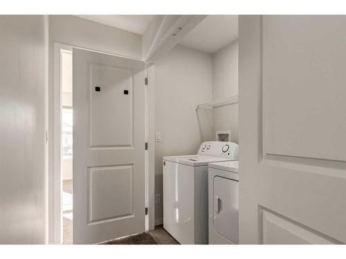 236 Dawson Drive, Chestermere, AB - Indoor Photo Showing Laundry Room