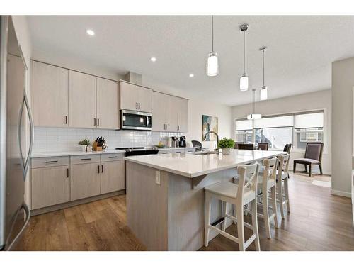 81 Legacy Reach Crescent Se, Calgary, AB - Indoor Photo Showing Kitchen With Upgraded Kitchen