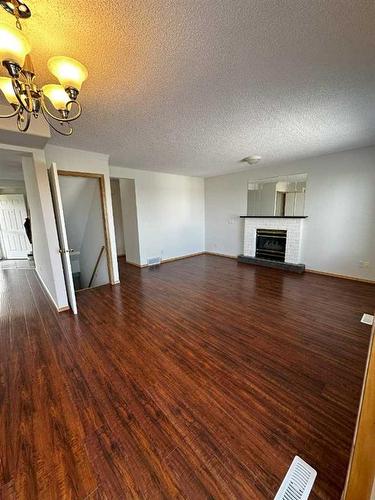 36 Harvest Glen Mews Ne, Calgary, AB - Indoor With Fireplace