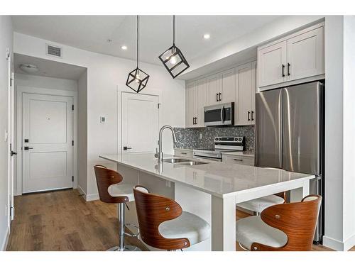 5208-200 Seton Circle Se, Calgary, AB - Indoor Photo Showing Kitchen With Stainless Steel Kitchen With Upgraded Kitchen