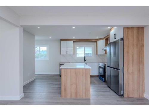 95 Holmwood Avenue Nw, Calgary, AB - Indoor Photo Showing Kitchen