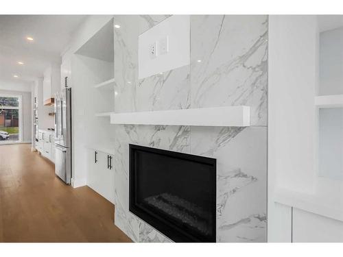 3725 Richmond Road Sw, Calgary, AB - Indoor Photo Showing Living Room With Fireplace