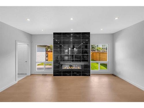 9828 19 Street Sw, Calgary, AB - Indoor With Fireplace