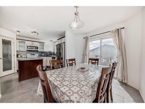 504 Saddlecrest Boulevard Ne, Calgary, AB - Indoor Photo Showing Dining Room