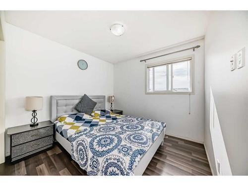 504 Saddlecrest Boulevard Ne, Calgary, AB - Indoor Photo Showing Bedroom