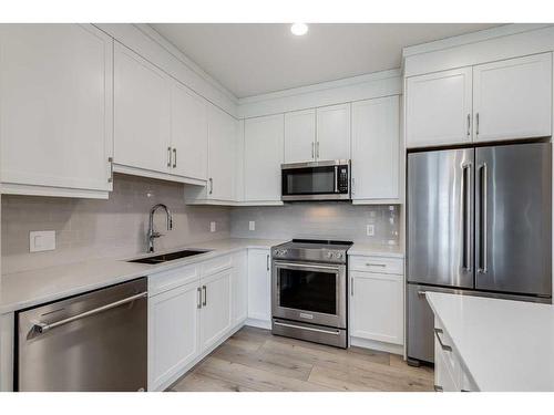 3208-80 Greenbriar Place Nw, Calgary, AB - Indoor Photo Showing Kitchen With Stainless Steel Kitchen