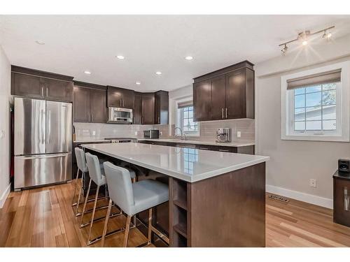 1-2018 27 Avenue Sw, Calgary, AB - Indoor Photo Showing Kitchen With Stainless Steel Kitchen With Upgraded Kitchen