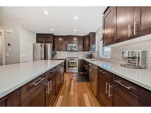 1-2018 27 Avenue Sw, Calgary, AB - Indoor Photo Showing Kitchen With Stainless Steel Kitchen With Upgraded Kitchen