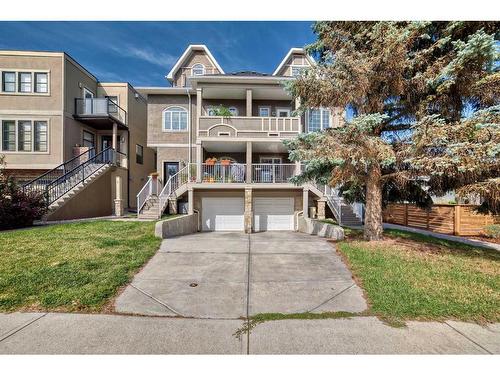 1-2018 27 Avenue Sw, Calgary, AB - Outdoor With Balcony With Facade