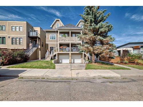 1-2018 27 Avenue Sw, Calgary, AB - Outdoor With Balcony With Facade