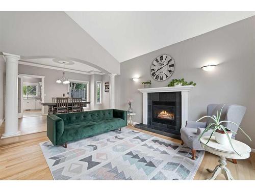 169 Patterson Boulevard Sw, Calgary, AB - Indoor Photo Showing Living Room With Fireplace