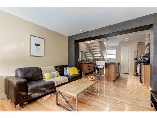 219 Aspen Hills Villas Sw, Calgary, AB - Indoor Photo Showing Living Room