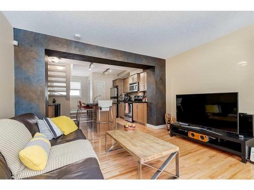 219 Aspen Hills Villas Sw, Calgary, AB - Indoor Photo Showing Living Room