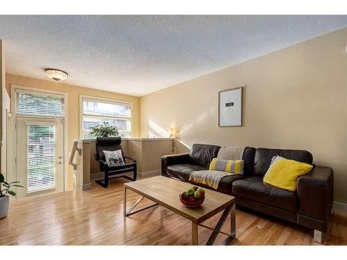 219 Aspen Hills Villas Sw, Calgary, AB - Indoor Photo Showing Living Room