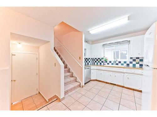 6039 Martingrove Road Ne, Calgary, AB - Indoor Photo Showing Kitchen With Double Sink