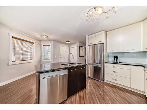 26-2318 17 Street Se, Calgary, AB - Indoor Photo Showing Kitchen With Double Sink With Upgraded Kitchen