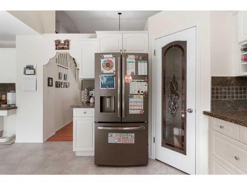 704 Woodside Drive Nw, Airdrie, AB - Indoor Photo Showing Kitchen