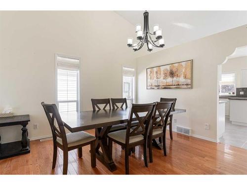 704 Woodside Drive Nw, Airdrie, AB - Indoor Photo Showing Dining Room