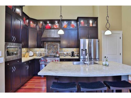 53 Westpoint Way Sw, Calgary, AB - Indoor Photo Showing Kitchen With Stainless Steel Kitchen With Upgraded Kitchen