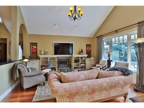 53 Westpoint Way Sw, Calgary, AB - Indoor Photo Showing Living Room With Fireplace