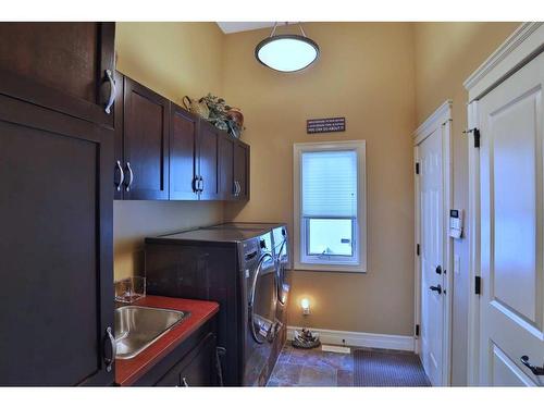 53 Westpoint Way Sw, Calgary, AB - Indoor Photo Showing Laundry Room