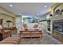 53 Westpoint Way Sw, Calgary, AB  - Indoor Photo Showing Living Room With Fireplace 