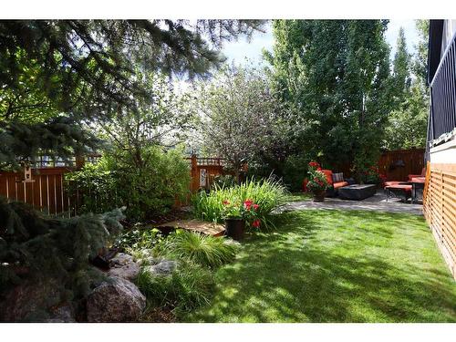 53 Westpoint Way Sw, Calgary, AB - Outdoor With Backyard