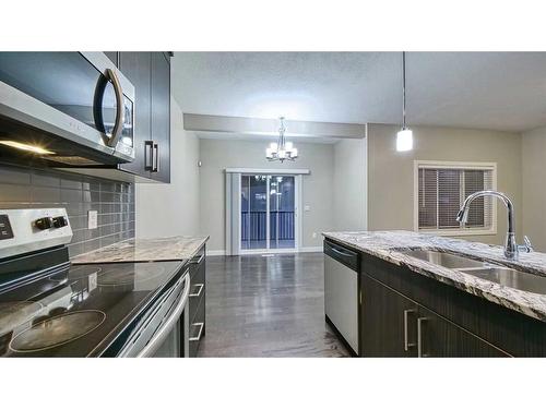 138 Nolanhurst Rise Nw, Calgary, AB - Indoor Photo Showing Kitchen With Double Sink With Upgraded Kitchen