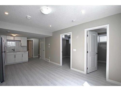 138 Nolanhurst Rise Nw, Calgary, AB - Indoor Photo Showing Kitchen With Double Sink