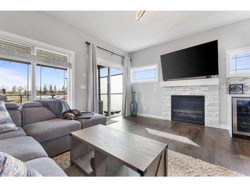 628 Muirfield Crescent, Lyalta, AB - Indoor Photo Showing Living Room With Fireplace