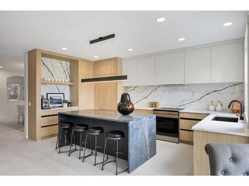 16 Johnson Place Sw, Calgary, AB - Indoor Photo Showing Kitchen With Upgraded Kitchen