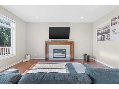 237 Panton Way Nw, Calgary, AB - Indoor Photo Showing Living Room With Fireplace