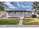 1059 Abbeydale Drive Ne, Calgary, AB  - Outdoor With Facade 