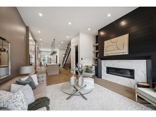 528 19 Avenue Sw, Calgary, AB - Indoor Photo Showing Living Room With Fireplace