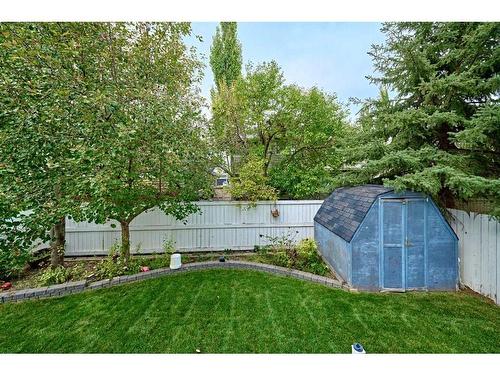 132 Evergreen Close Sw, Calgary, AB - Outdoor With Backyard