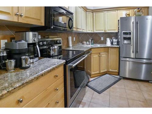 103-11642 Valley Ridge Park Nw, Calgary, AB - Indoor Photo Showing Kitchen