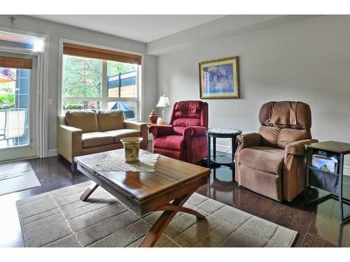 103-11642 Valley Ridge Park Nw, Calgary, AB - Indoor Photo Showing Living Room