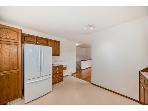 3327 28 Street Se, Calgary, AB - Indoor Photo Showing Kitchen