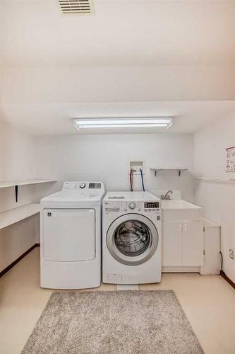 3327 28 Street Se, Calgary, AB - Indoor Photo Showing Laundry Room