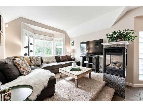 2112 28 Avenue Sw, Calgary, AB - Indoor Photo Showing Living Room With Fireplace