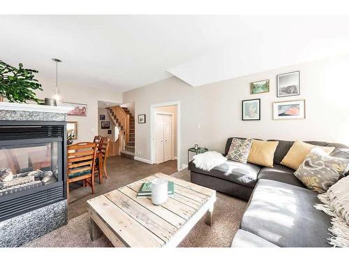 2112 28 Avenue Sw, Calgary, AB - Indoor Photo Showing Living Room With Fireplace