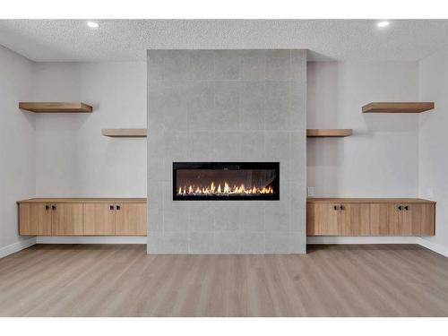 63 Martinview Crescent Ne, Calgary, AB - Indoor With Fireplace