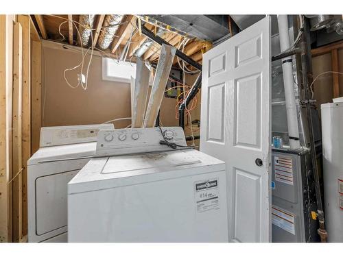 119 Castleglen Road Ne, Calgary, AB - Indoor Photo Showing Laundry Room